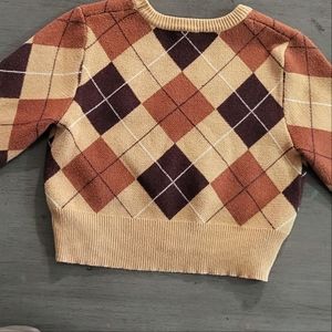 Large, brown argyle sweater/crop top